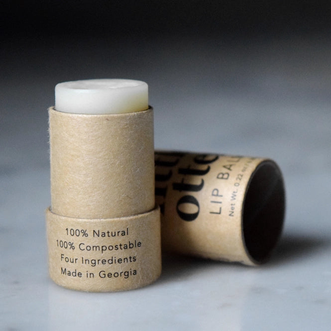 Open lip balm next to cap