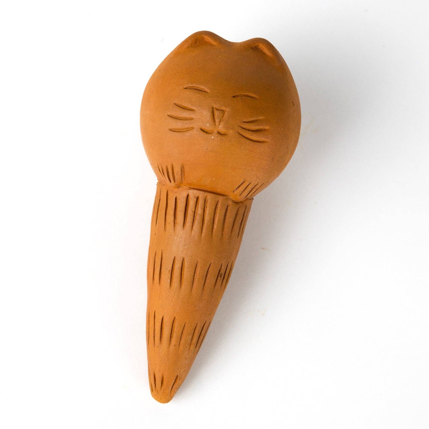 Terracotta cat-shaped watering device on a white background