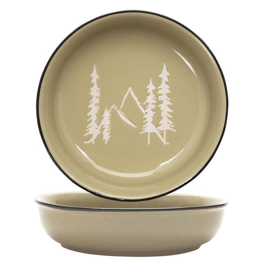 Green ceramic bowls with mountain and tree design on a white background