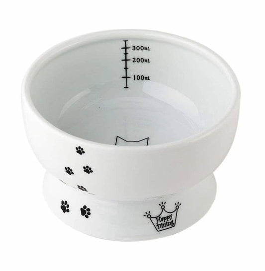 White ceramic bowl with black paw prints and 'Happy Dining' text on a white background