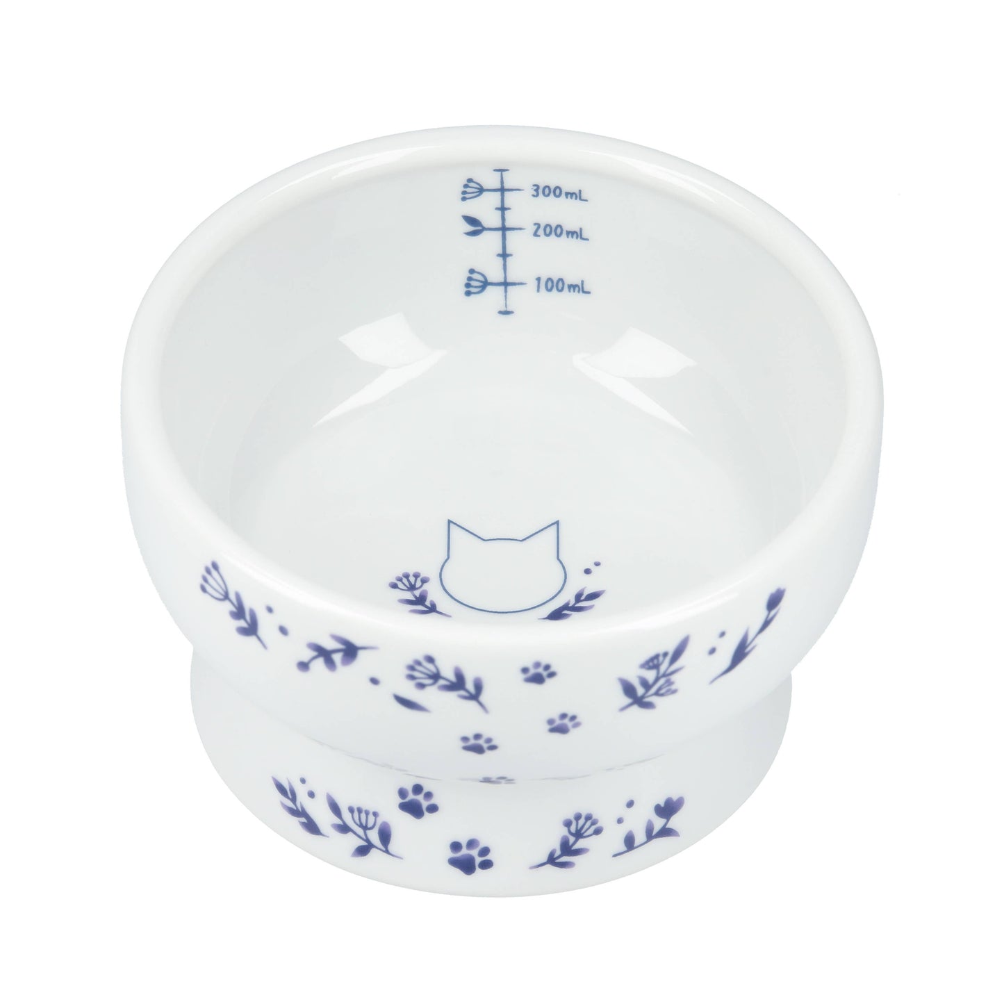 White ceramic bowl with blue floral and paw print design on a white background